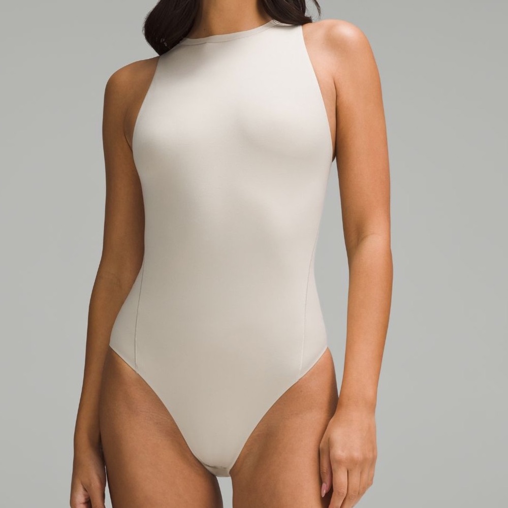 Sleeveless High-Neck Bodysuit in Cream - Women Tops